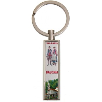 Сувенирен метален ключодържтел - свирка - мъж и жена в народни носии и Двореца в Балчик