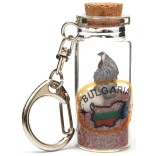 Сувенирен ключодържател - стъклена бутилка с цветен пясък, миди и рапанчета