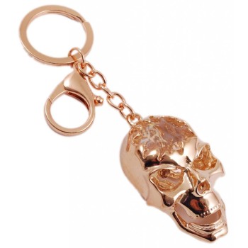 Сувенирен метален ключодържател - череп с голям камък и подвижна челюст
