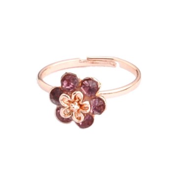 Златист пръстен с фигурка - цвете, декорирано с цветни камъчета