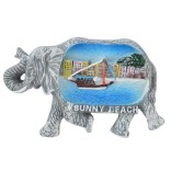 Декоративна фигурка с магнит във формата на слон с вдигнат хобот - морски пейзаж