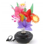 Красив декоративен букет - цветя от плат върху светеща керамична поставка