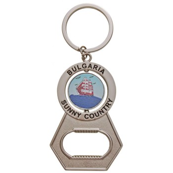 Сувенирен метален ключодържател - отварачка с въртяща се плочка, декорирана с два делфина с фар и кораб в море